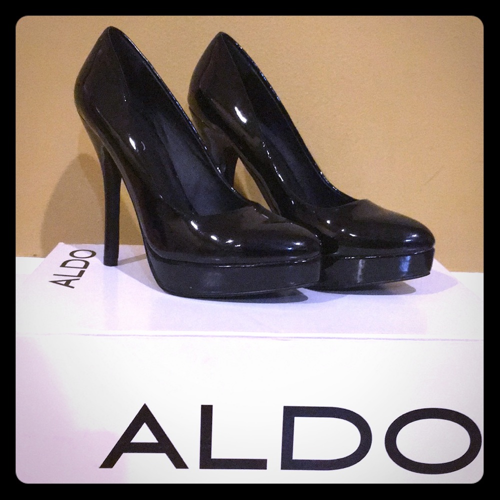Aldo black patent pumps